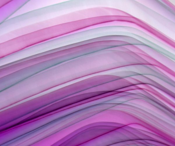 Abstract waves representing smooth airflow and breathing.